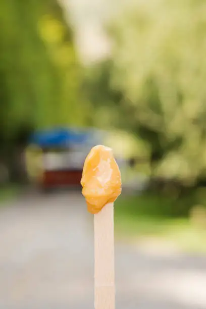 Photo of homemade honey on Popsicle stick