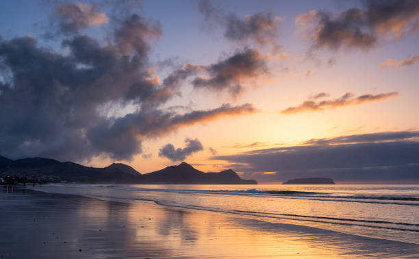 istock The Sunrise On Porto Santo Beach 1211340264