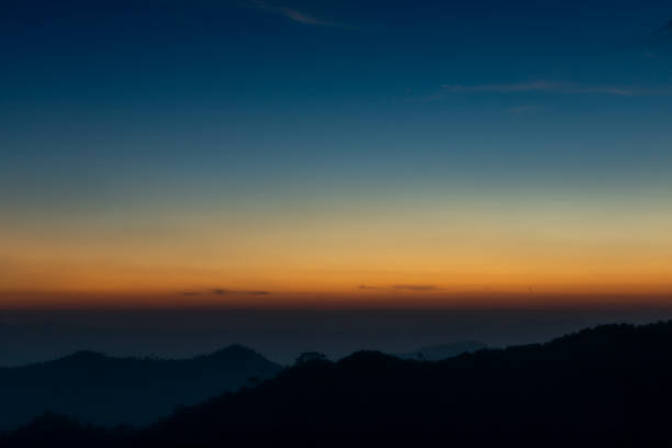 istock Horizon sky with silhouette mountain before sunrise 1211341494