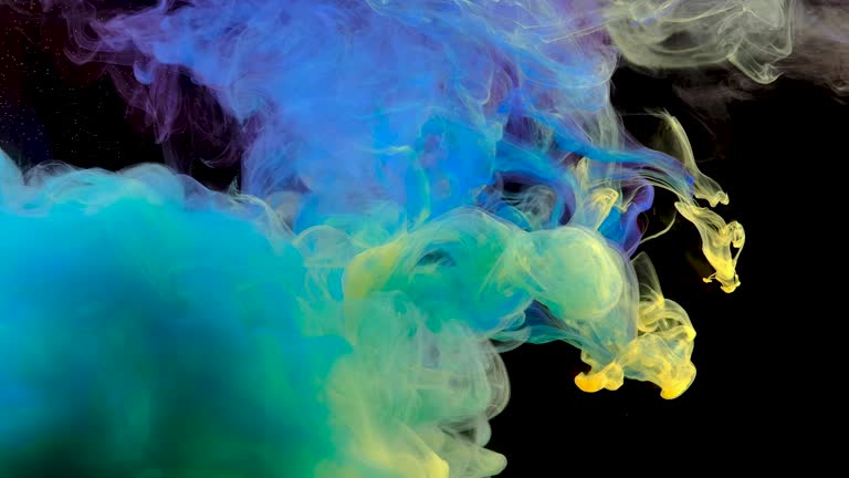 4K, Color drops in water, abstract color mix, drop of Ink color mix paint falling on water Colorful ink in water, 4K footage,