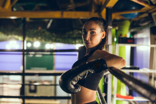 istock Women sport team boxing indoor 1211342291