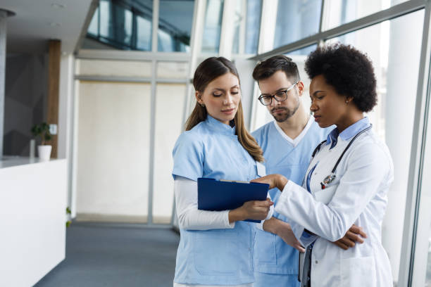 istock Giving the doctor a progress report on a patient 1211342876