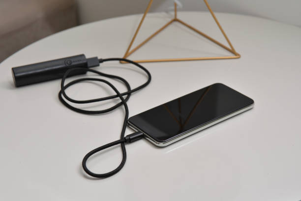 istock Smartphone charging with a power bank 1211342904