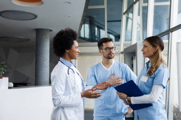 istock Giving the doctor a progress report on a patient 1211343545