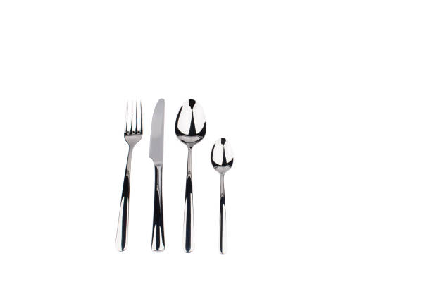 istock Set of fork, knife and spoons isolated on white. 1211344766