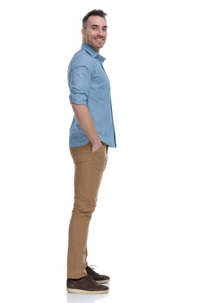 istock Side view of happy  casual man smiling 1211345619