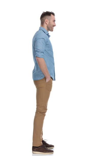 istock Side view of positive casual man smiling 1211345663