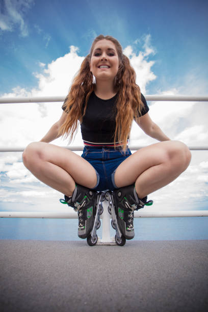 istock Happy crazy woman wearing roller skates 1211347180