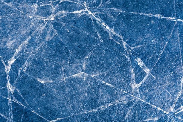 istock beautiful ice with cracks. texture of frozen water 1211348455