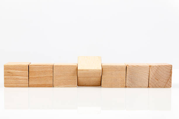 istock Wooden cubes on a white background 1211348839