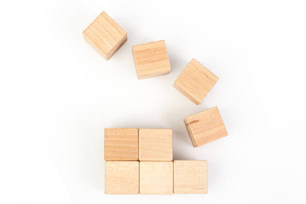 istock Wooden cubes on a white background 1211350033