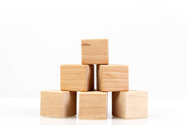 istock Wooden cubes on a white background 1211350245