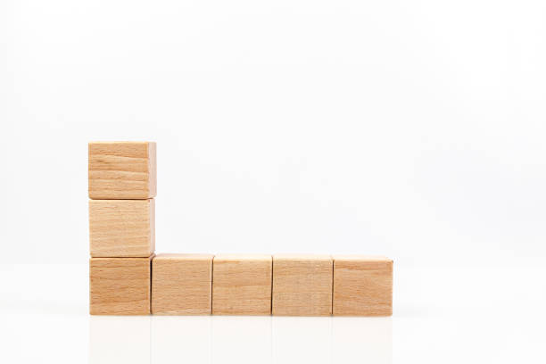 istock Wooden cubes on a white background 1211350375