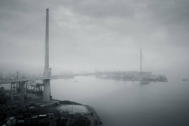 istock Hong Kong port and Stonecutters bridge 1211350533