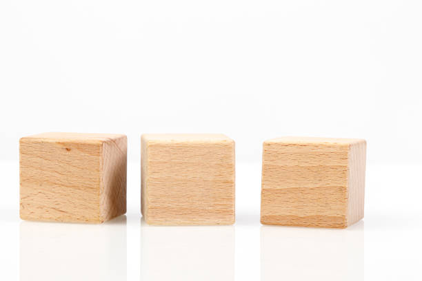istock Wooden cubes on a white background 1211350554