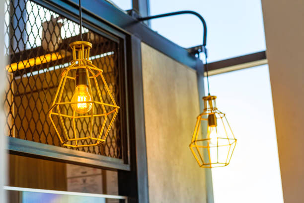 istock Modern design ceiling lamp hanging in the coffee shop 1211350561
