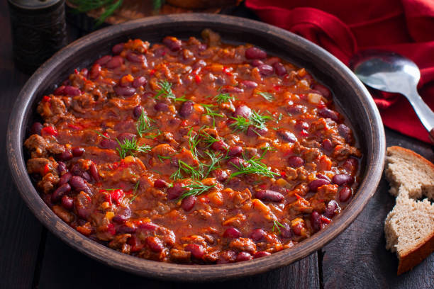 istock Chili con carne, traditional Mexican dish with beef and beans, selective focus 1211350668