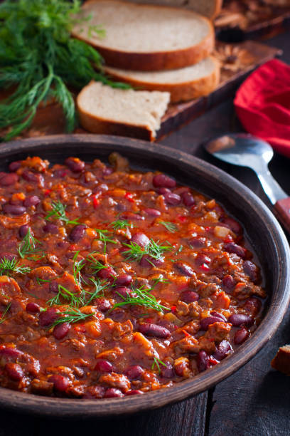 istock Chili con carne, traditional Mexican dish with beef and beans, selective focus 1211350766