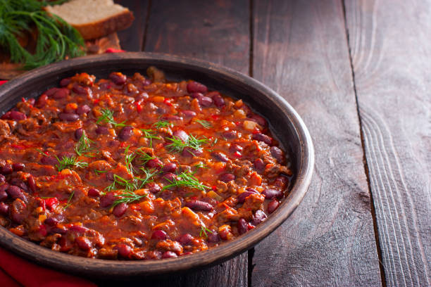 istock Chili con carne, traditional Mexican dish with beef and beans, horizontal, copy space 1211350797