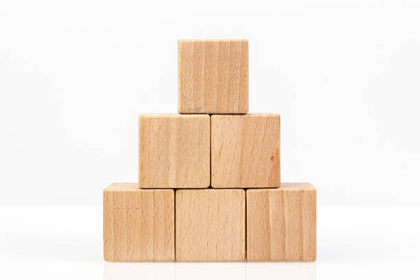istock Wooden cubes on a white background 1211351432