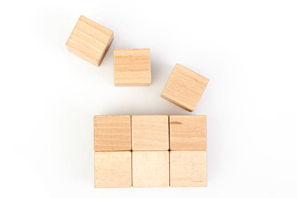 istock Wooden cubes on a white background 1211351696