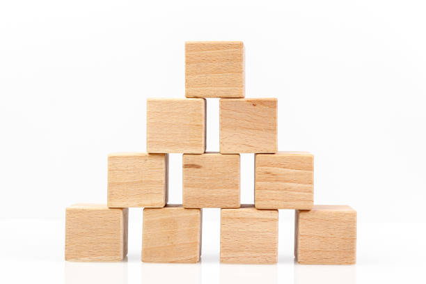 istock Wooden cubes on a white background 1211351846
