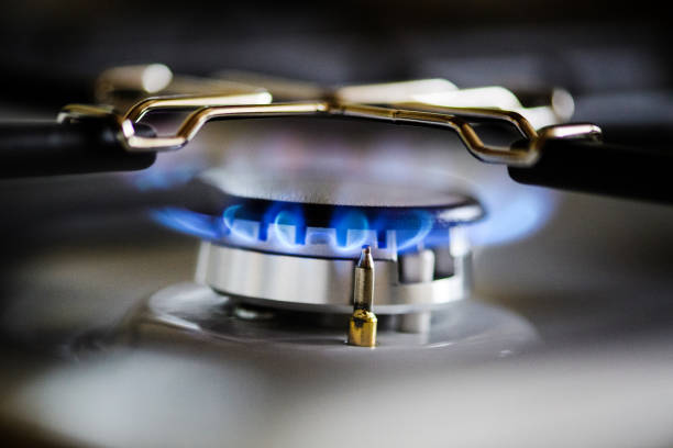 istock Natural gas burning on kitchen gas stove 1211351968