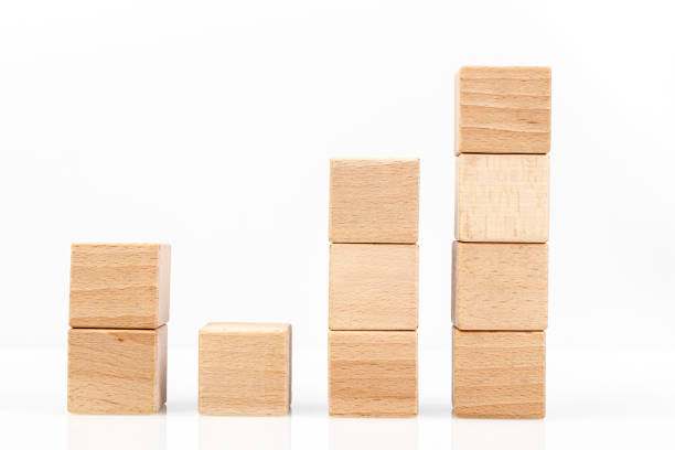 istock Wooden cubes on a white background 1211351996