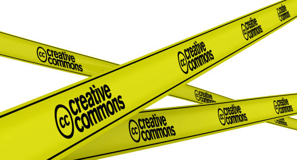 Creative commons. Labeled yellow warning tapes stock photo