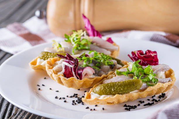 istock delicious snack tartlets on rustic wooden background 1211354937
