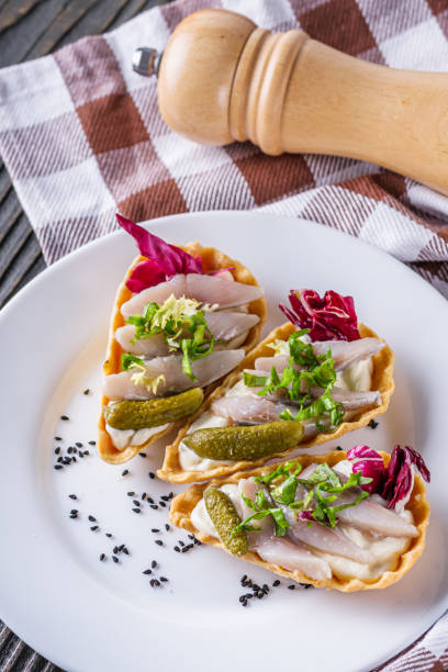 istock delicious snack tartlets on rustic wooden background 1211355030
