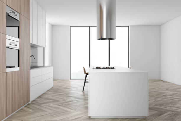 istock White and wooden kitchen with bar, side view 1211355222