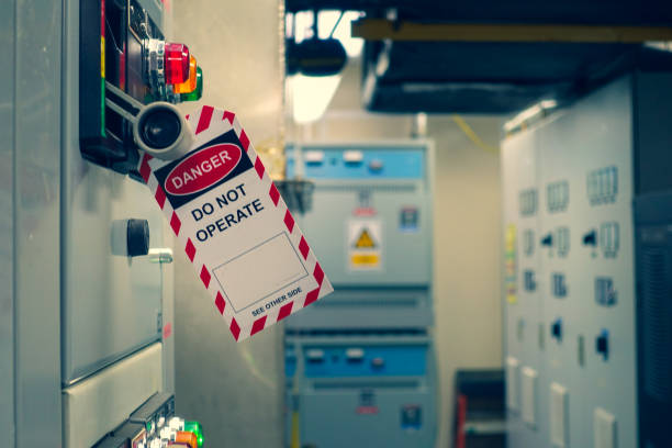 istock Red, white Lock out & Tag out for Lock station,machine - specific or switch gear roomd evices and safety first point, Cyber security or safety industrial concept. 1211355954