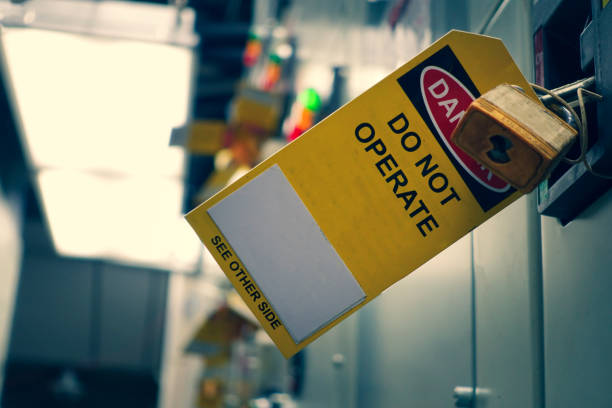 istock Yellow Lock out & Tag out for Lock station,machine - specific or switch gear roomd evices and safety first point, Cyber security or safety industrial concept. 1211355992