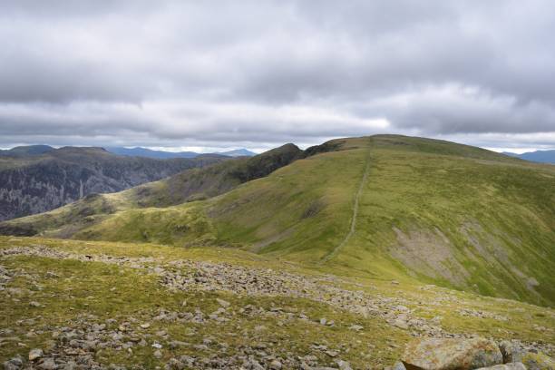 istock The long dry stone wall up to Scoat fell 1211357754