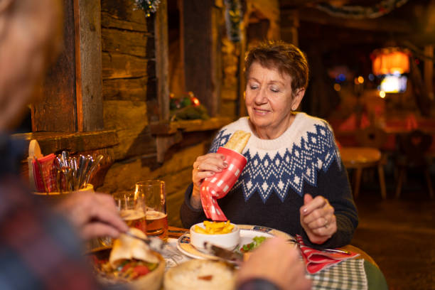 seniors eating out in alpin mountain restaurant