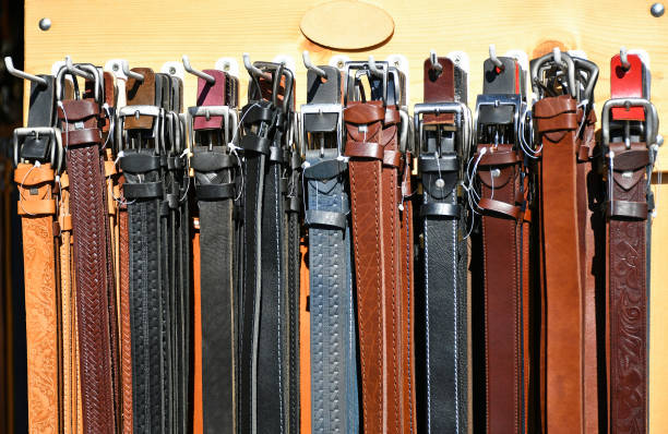 istock New leather fashion belt in a row 1211359843