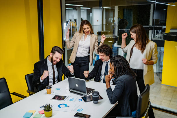 istock Young successful business people at meeting 1211361054