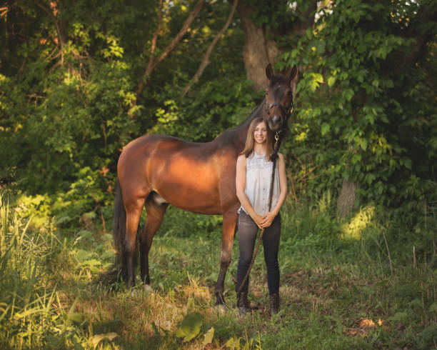 istock Girl and he Horse 1211361367