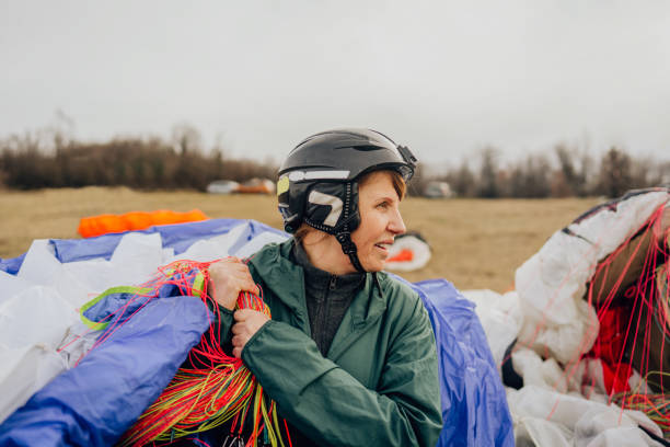 istock Senior woman carrying her parachute 1211361406
