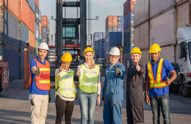 istock Success Teamwork Concept, Business people engineer and worker team smiling with giving thumbs up as sign of Success 1211363866