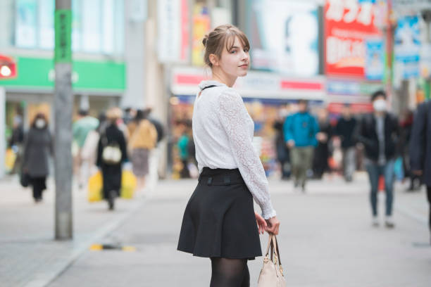 istock Women sightseeing in Shibuya 1211364603