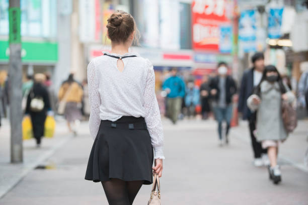 istock Women sightseeing in Shibuya 1211364784