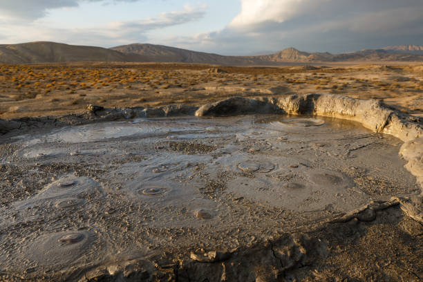 istock Crater of mud volcano in Gobustan 1211365441