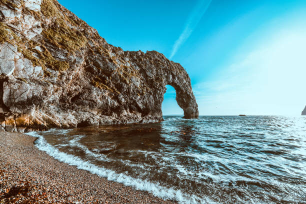 Footprints in the sand at Hive beach, Bridport, Dorset