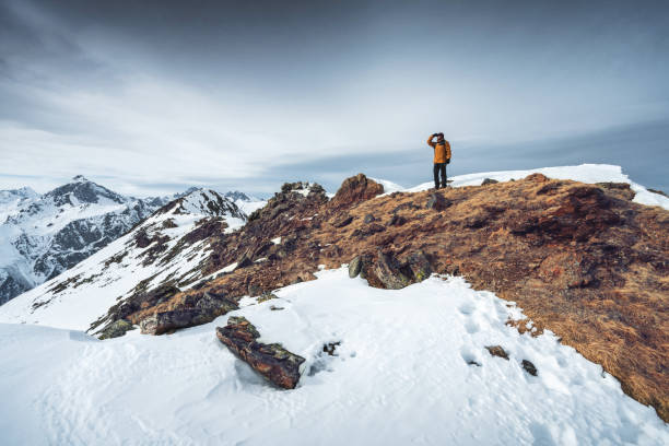 Man explores wild locations in the mountains