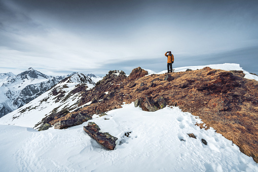 Man explores wild locations in the mountains