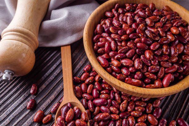 istock Fresh organic natural beans on wooden rustic background 1211368684