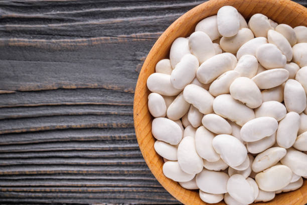 istock Fresh organic natural beans on wooden rustic background 1211368792