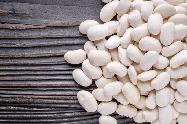 istock Fresh organic natural beans on wooden rustic background 1211369950
